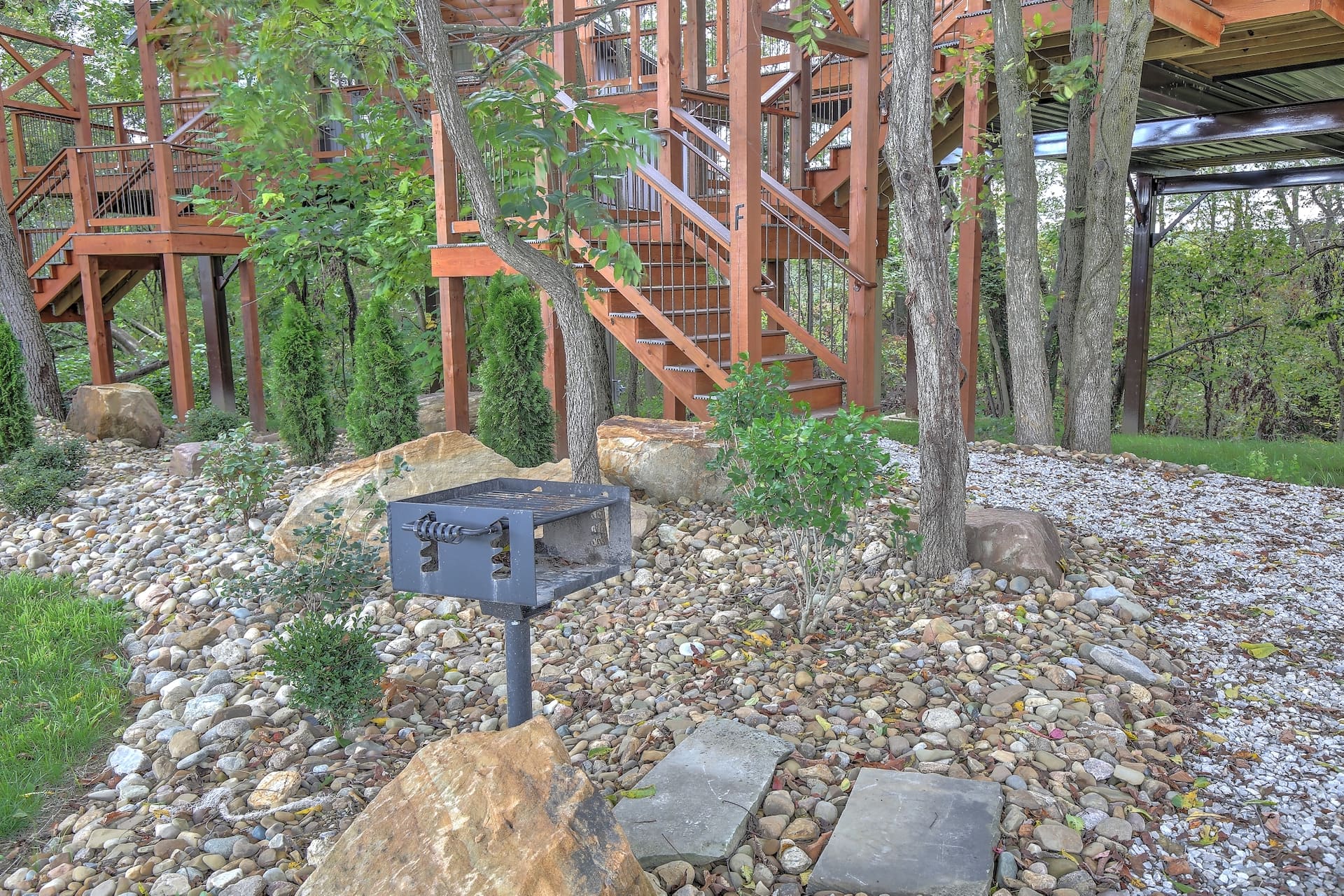 Outdoor grill and deck space at Cricket Hill Treehouse F