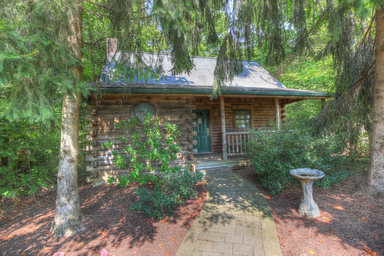 Wild Rose cabin exterior among the trees at Cricket Hill